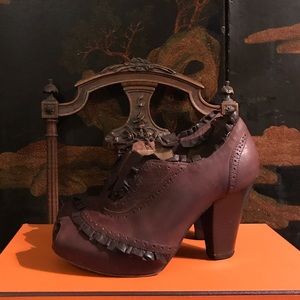 Leather ruffle peep-toe ankle booties